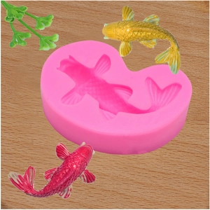 Pink silicone mold for koi fish resin crafts with gold and red finished samples