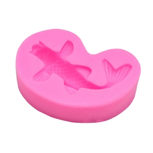 Macro shot of pink silicone koi fish mold showing detailed scale and fin textures