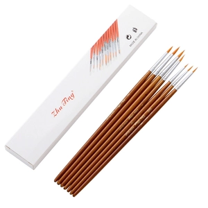 Close-up of nine detail paint brushes with nylon hair and natural wooden handles
