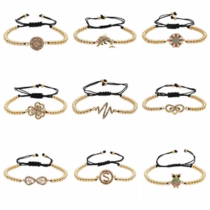 Adjustable braided bracelets with gold beads and colorful zircon charms including heart and owl
