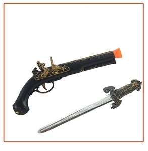 Close-up of vintage pirate toy set including a plastic flintlock pistol and a dagger