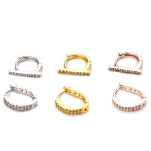 Three pairs of micro-pave zircon cartilage hoop earrings in silver, gold, and rose gold finishes