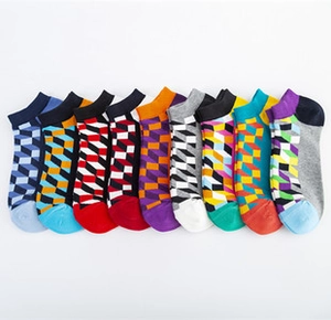 Detail of nine pairs of colorful geometric cube pattern cotton low-cut ankle socks