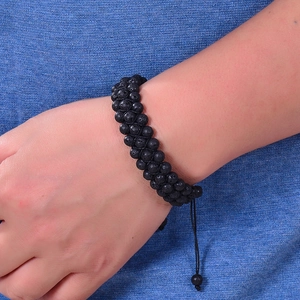 Adjustable triple-layer lava stone beaded bracelet with natural volcanic rock texture