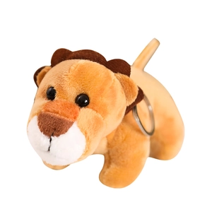 Cute plush lion keychain pendant with brown mane and soft material on white background
