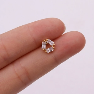 Detail of rose gold stud earring featuring three sparkling rectangle cut zircons