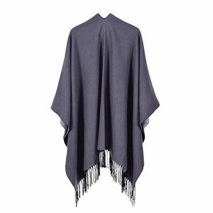 Solid dark grey women's oversized knit shawl with fringe trim for winter warmth