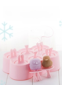 Close-up of pink 6-cell silicone popsicle mold with cute rabbit ear cartoon handles