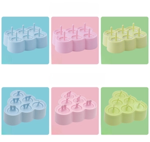 Detail of DIY mini silicone popsicle molds in rectangle and triangle shapes with six slots