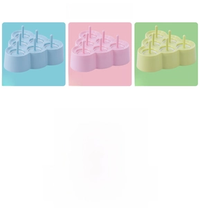 Detail showing colorful triangular mini popsicle molds in blue, pink, and green colors