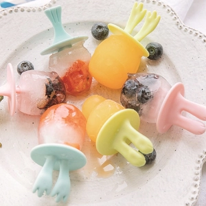 Cartoon animal silicone popsicle mold with bird-shaped sticks and fresh fruit slices