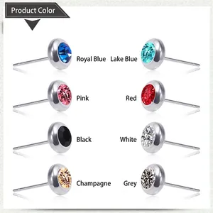 Set of eight pairs of surgical steel stud earrings with colorful cubic zirconia crystals