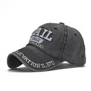 Detailed embroidery of TRAIL 1962 and ELEVATION text on washed cotton baseball cap