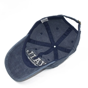 Detailed interior of vintage cotton baseball cap showing stitching and inner sweatband