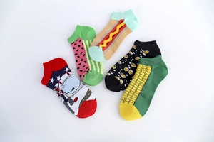Colorful cotton low-cut socks with fun astronaut, watermelon, and food pattern details