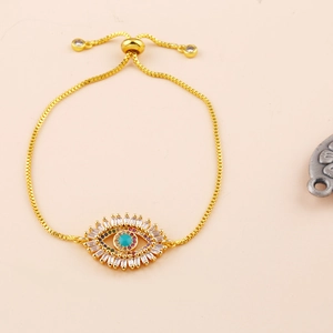 Adjustable golden evil eye bracelet with colorful pavé crystals and turquoise center stone