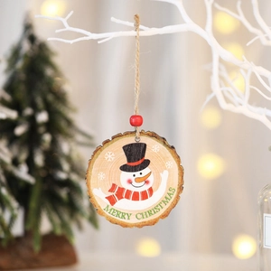 Round wooden Christmas ornament with snowman painting and Merry Christmas text on tree