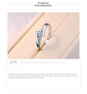 Detail of adjustable S925 silver ring with sparkling round cut zircon and curved band