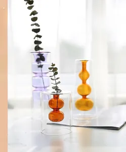 Vaso creativo in vetro a doppio strato con anima sferica colorata in viola e ambra