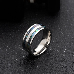 Polished silver titanium ring for men with colorful abalone shell inlay at 45 degree angle
