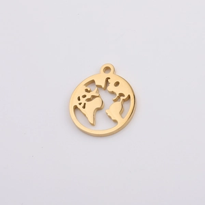 Detailed macro view of golden hollow-out world map pendant made of mirrored stainless steel