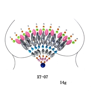 Detailed view of colorful rhinestone body jewelry for music festivals and parties