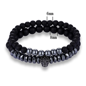 Men's skull bracelet set with black matte beads and grey metallic beads in 6mm and 8mm sizes
