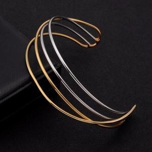 Bracelet jonc multicouche en acier titane au design épuré or argent et noir élégant
