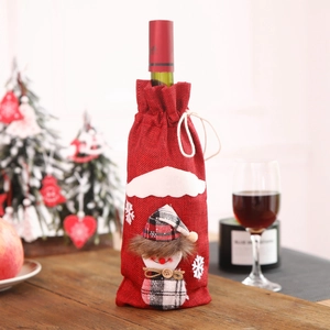 Festive red burlap wine bottle cover with 3D snowman doll for Christmas table decoration
