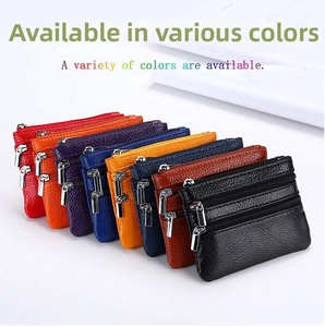 Macro detail of multi-color leather coin purses with three-layer zippers and lychee texture