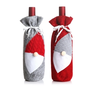 Christmas gnome wine bottle covers in red and grey felt for festive holiday table decor