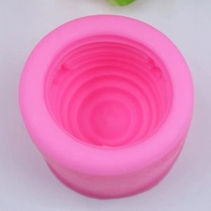 Macro detail of pink silicone mold with concentric circle textures for fondant decoration