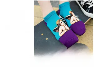 Detail of blue and purple knitted cotton socks with twin cupid angel pattern jacquard