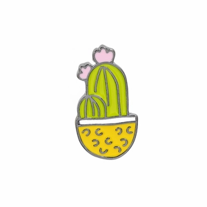 Detailed view of the green cactus enamel pin with pink flower and yellow pot on white background