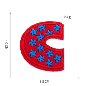Close-up of letter C embroidery patch with red base and blue stars, 4x3.5cm dimension