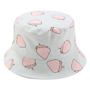 Light blue reversible strawberry bucket hat made of canvas for sun protection and casual wear