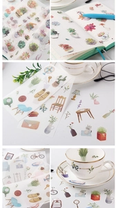 Close-up of cute succulent and lifestyle stickers on a journal for creative decoration