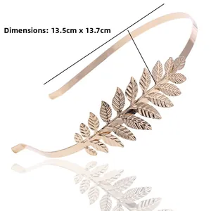 Detailed view of golden leaf headband showing 13.5cm by 13.7cm product dimensions
