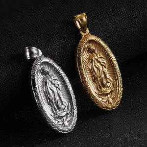 Vintage Virgin Mary pendant necklace in gold and silver finish with embossed details