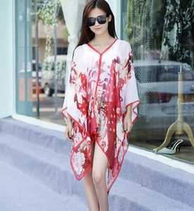 Detail of red floral and skull print lightweight chiffon beach cover-up shawl wrap