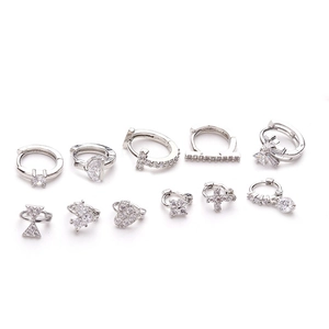 Silver micro-pave cubic zirconia earring set with diverse charms and elegant hoops