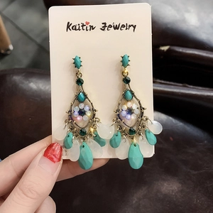 Vintage silver needle earrings with baroque crystals and turquoise tassels in gold finish