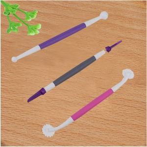 Detailed view of 3-piece plastic fondant carving pens and clay sculpting tools set