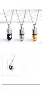 Detail view of 30x10mm stainless steel capsule pendant showing size and material specs