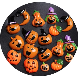 Assorted Halloween resin charms including pumpkins and wizard hats for DIY crafts