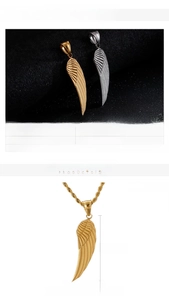 Detail of stainless steel wing pendant with dimensions 40x12mm and 6g weight spec