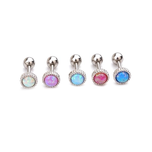 Set of 5 stainless steel opal ear studs in white, pink, and blue on white background