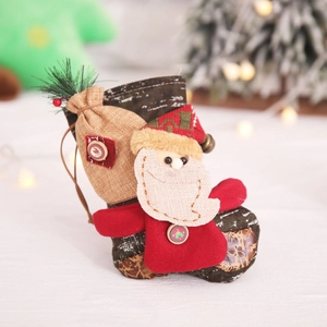 Classic Christmas stocking with Santa Claus design, bells and pine needles decor