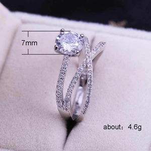 Elegant double-layered silver ring with 7mm round zircon and pavé setting stones