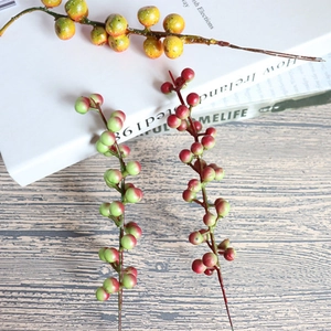 Artificial orange berry branches for DIY home decor and elegant tabletop displays